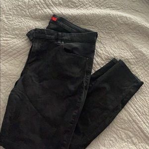 Jennifer Lopez. Stretchy black leggings. Size 14